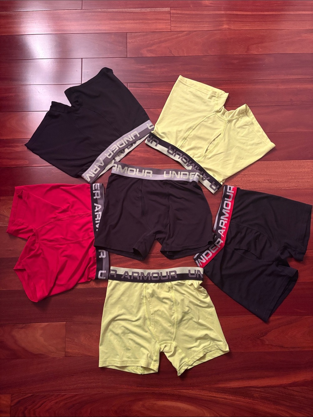 Boys M Athletic Under Armour Underwear Pack - Black, Red, and Yellow.